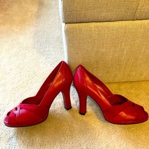 Red peep toe pumps